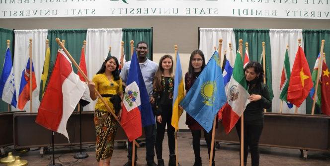 Students taking picture at festival of nations